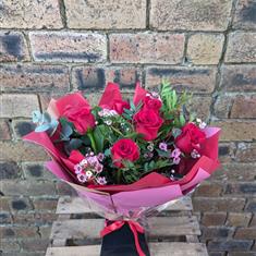 Half Dozen Red Roses With Seasonal Filler 